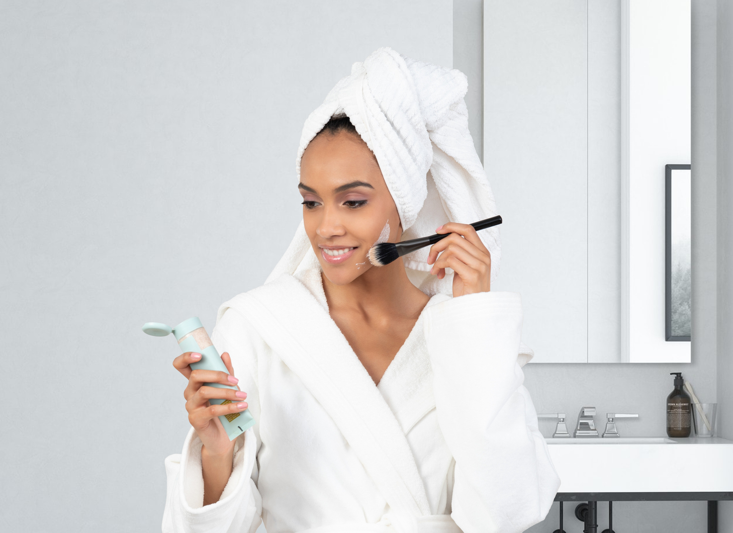 Why Photography and Videography Matter for Your Website: woman in robe takes morning bath and makeup